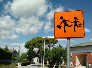 A "children crossing" sign.