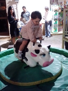 Bianca riding the mechanical bull.