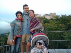 Patrizia, Vito, Arianna, and Bianca with the castle.