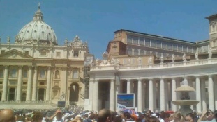 Some of the big screens set up for the Pope's address.